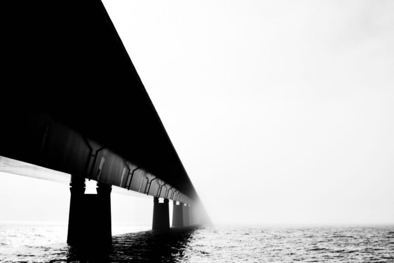 Bridge running out into thick fog