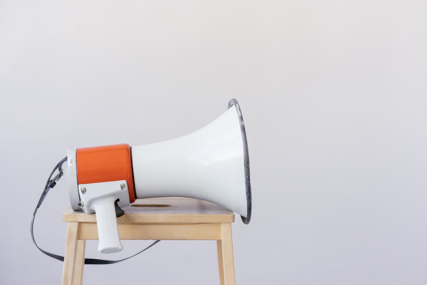 Megaphone standing on a wooden stool