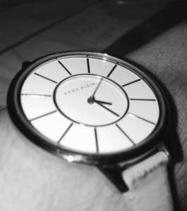 Close-up of a wristwatch on a sleeve
